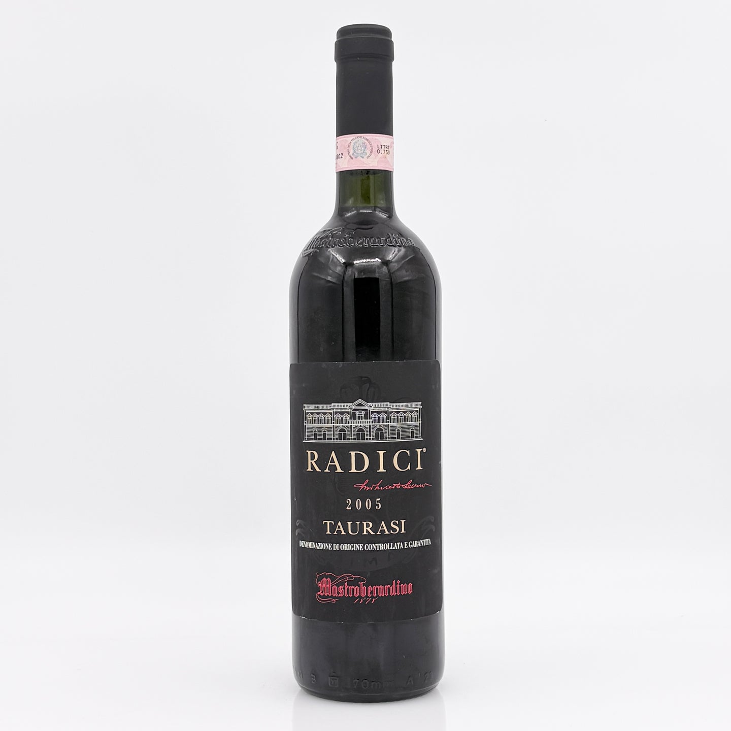Red wine bottle with 'Radici' label on a white background