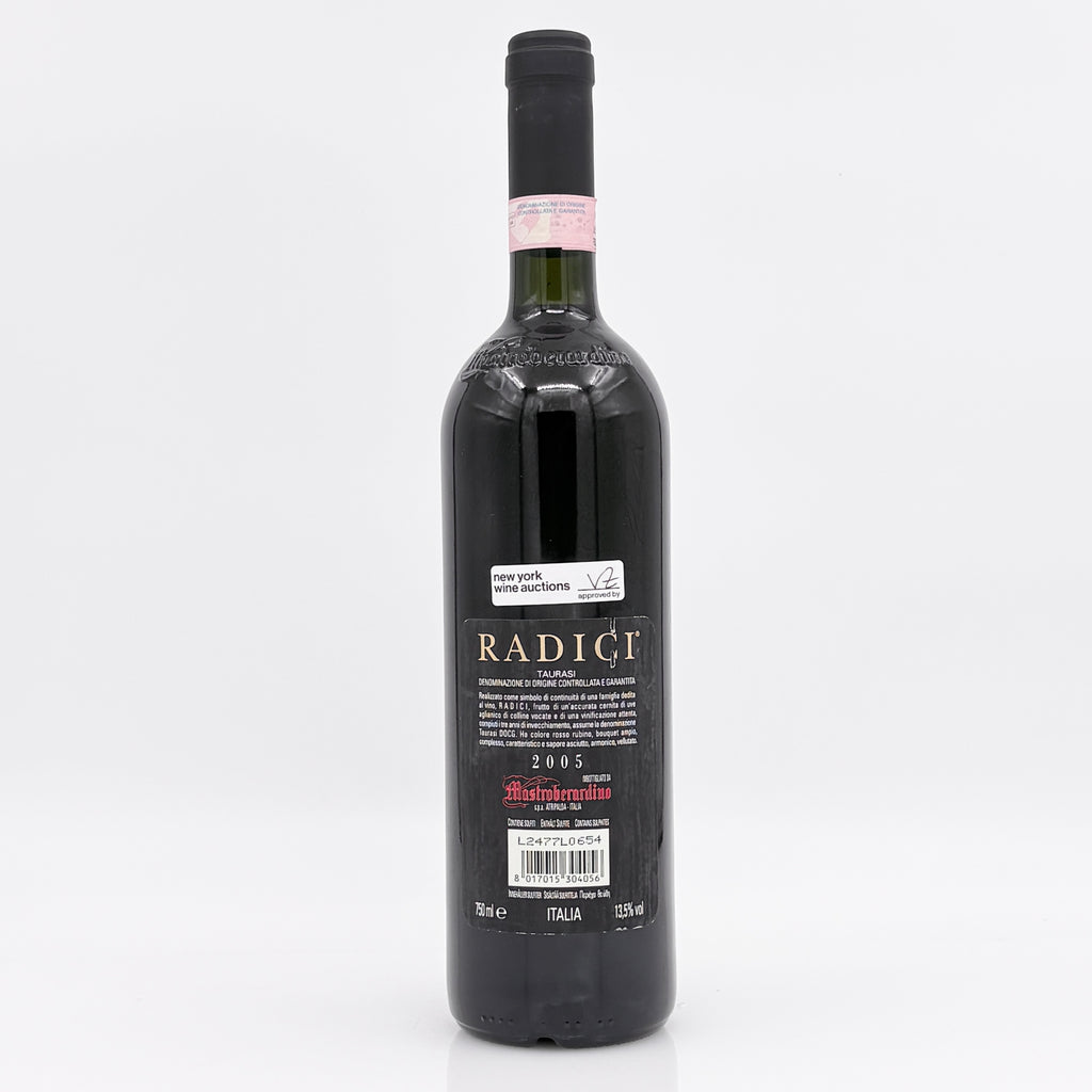 Red wine bottle with 'Radiçi' label on a white background
