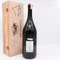 Large wine bottle with a wooden box labeled 'Sobrero' on a white background