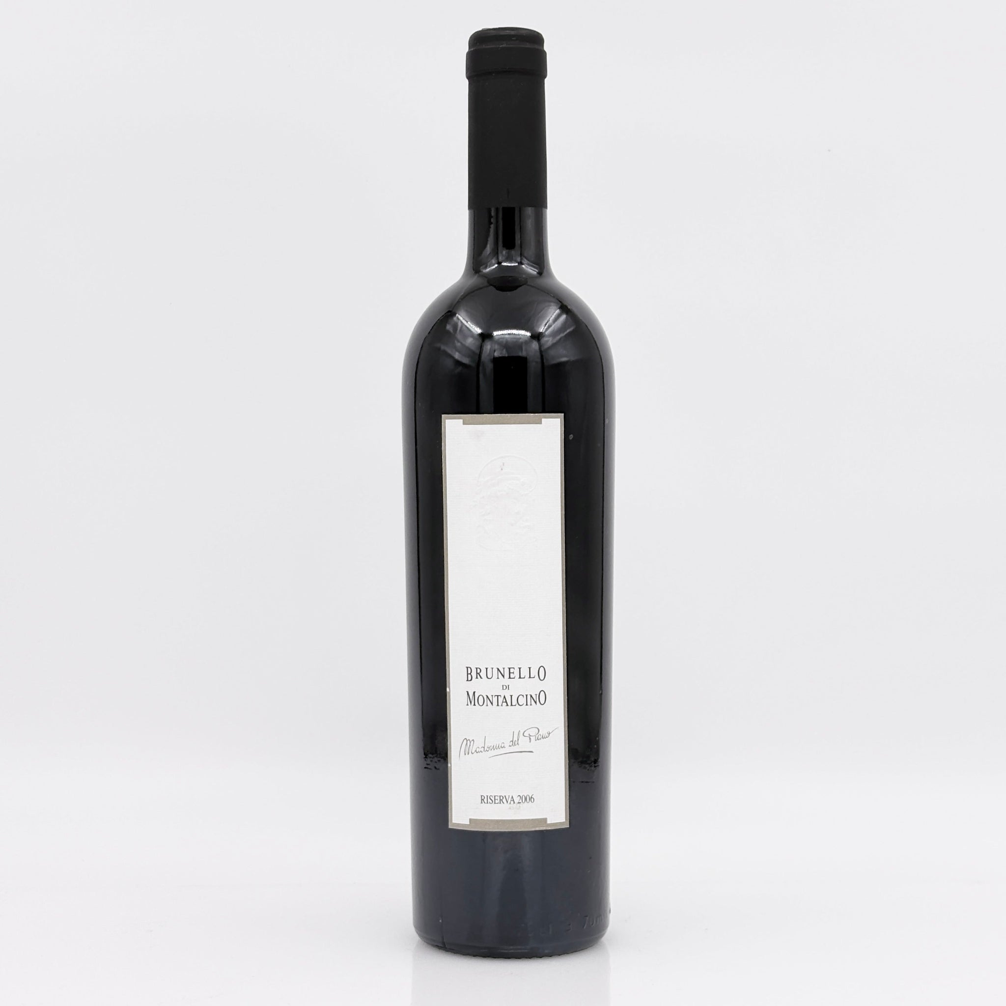 Wine bottle with a white label on a light gray background