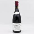 Wine bottle with a white label on a light gray background