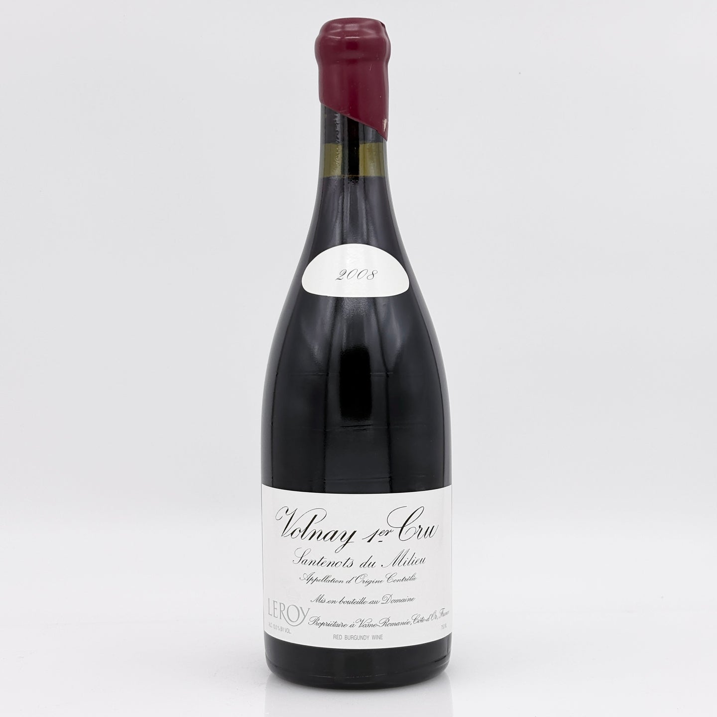 Wine bottle with a white label on a light gray background