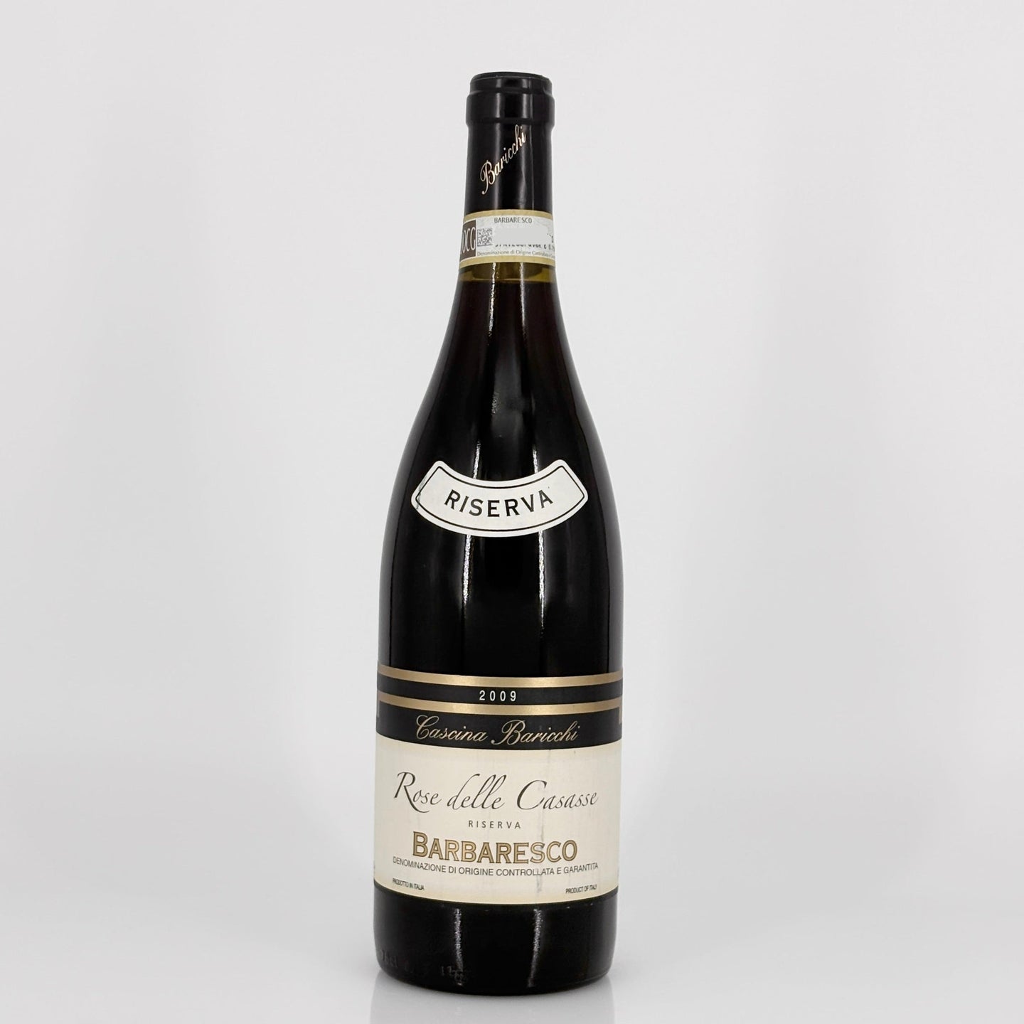Wine bottle with 'Riserva' label on a white background