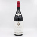 Wine bottle with a white label on a light gray background