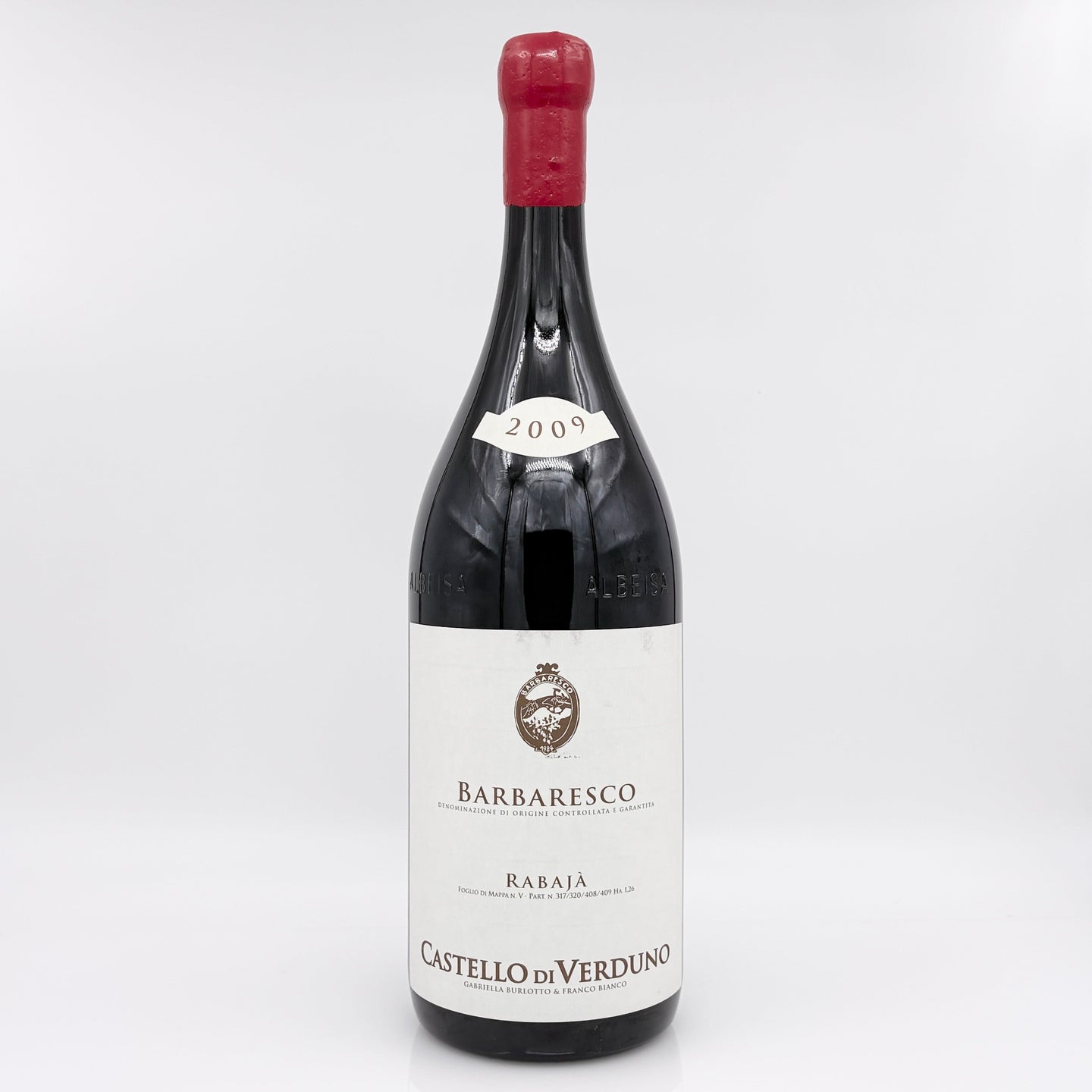 Wine bottle with a white label on a light gray background