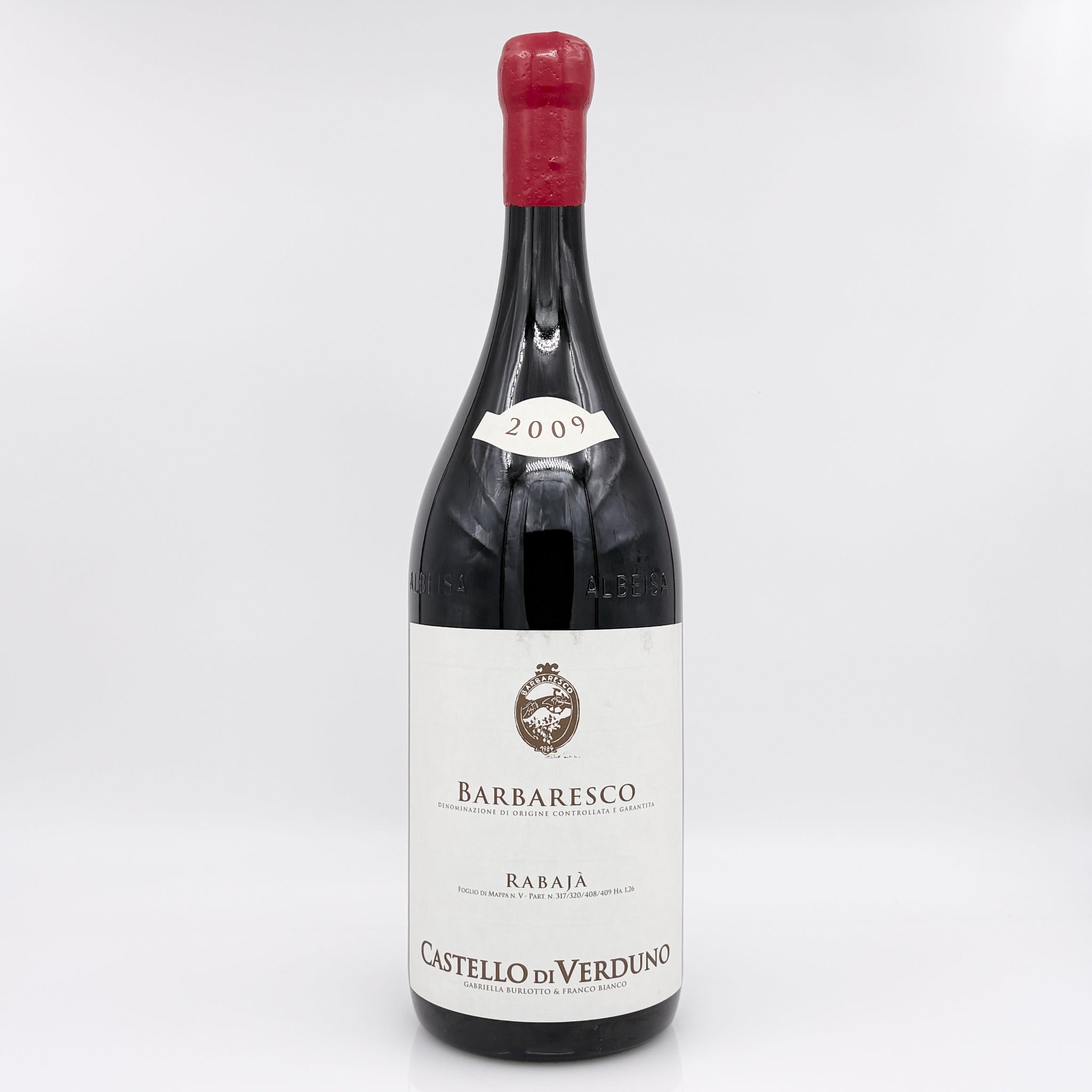 Wine bottle with a white label on a light gray background