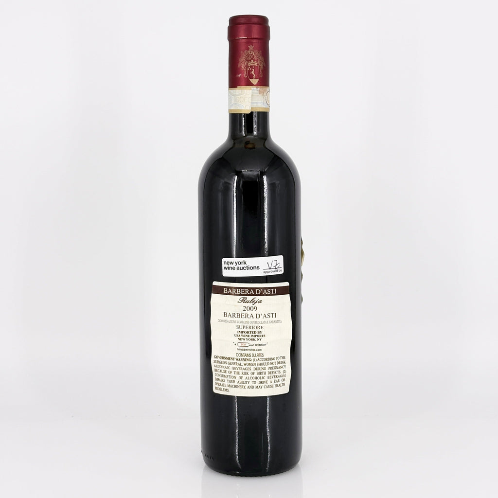 Bottle of Barbera d'Asti wine on a white background
