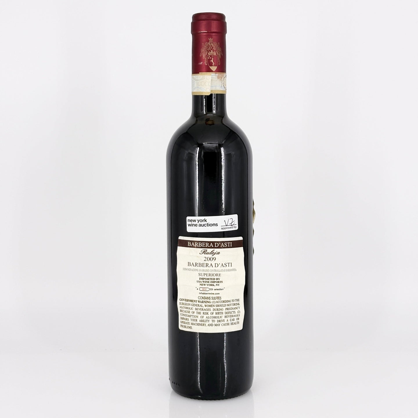 Bottle of Barbera d'Asti wine on a white background