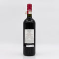 Wine bottle with a red label on a white background