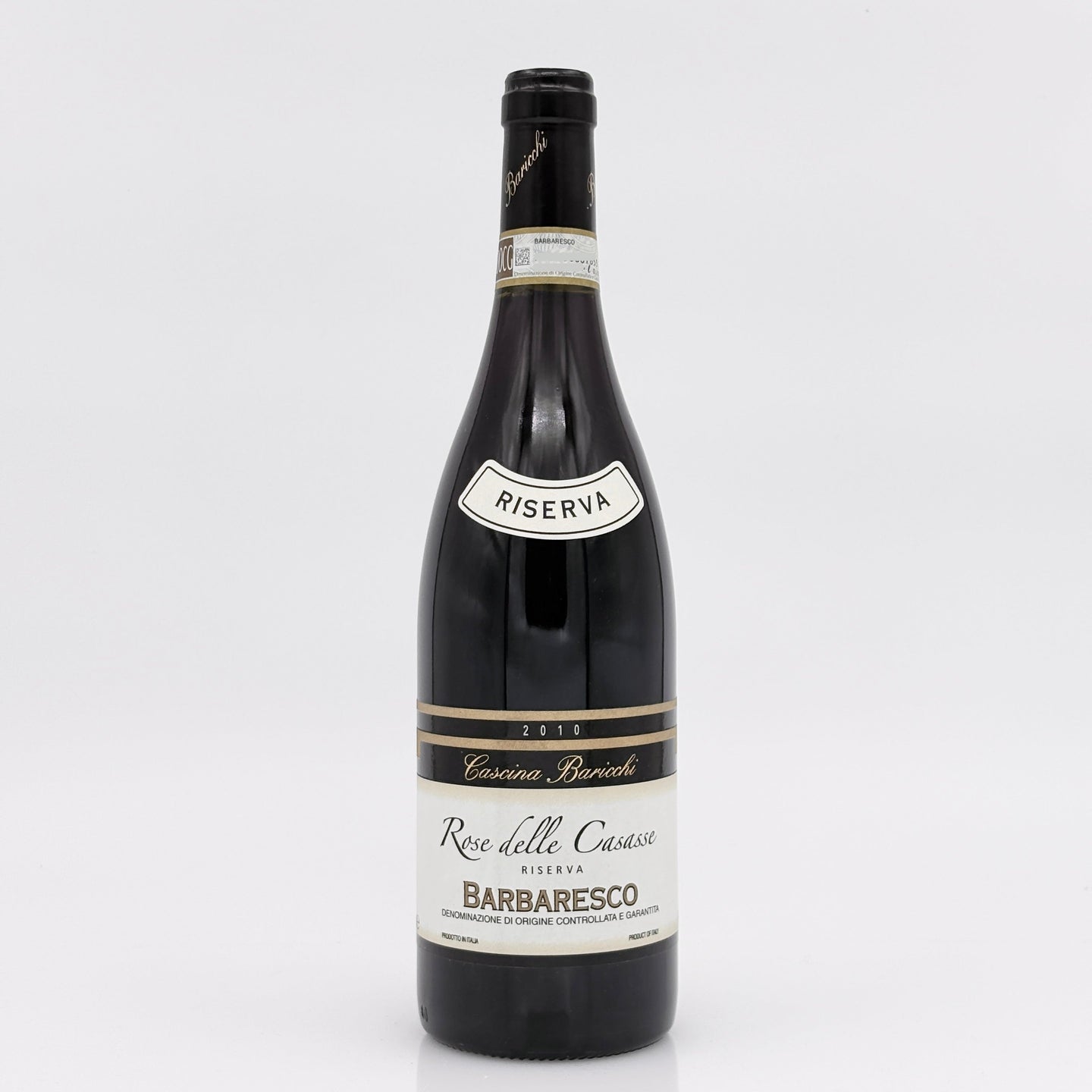 Wine bottle with 'Riserva' label on a white background