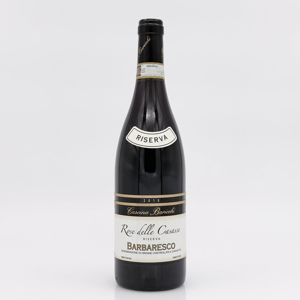 Wine bottle with 'Riserva' label on a white background