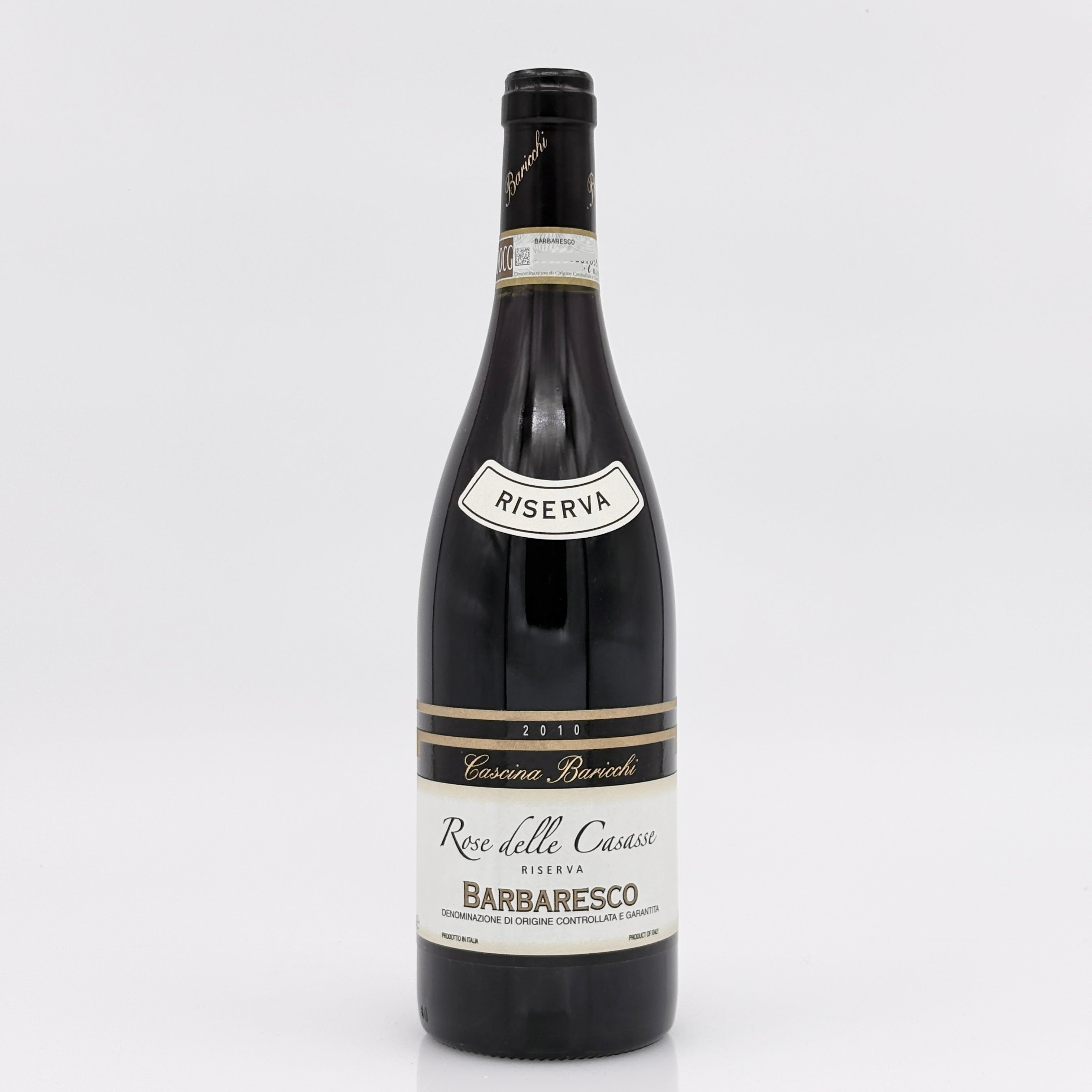 Wine bottle with 'Riserva' label on a white background