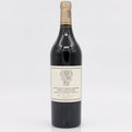 Wine bottle with a label on a light gray background