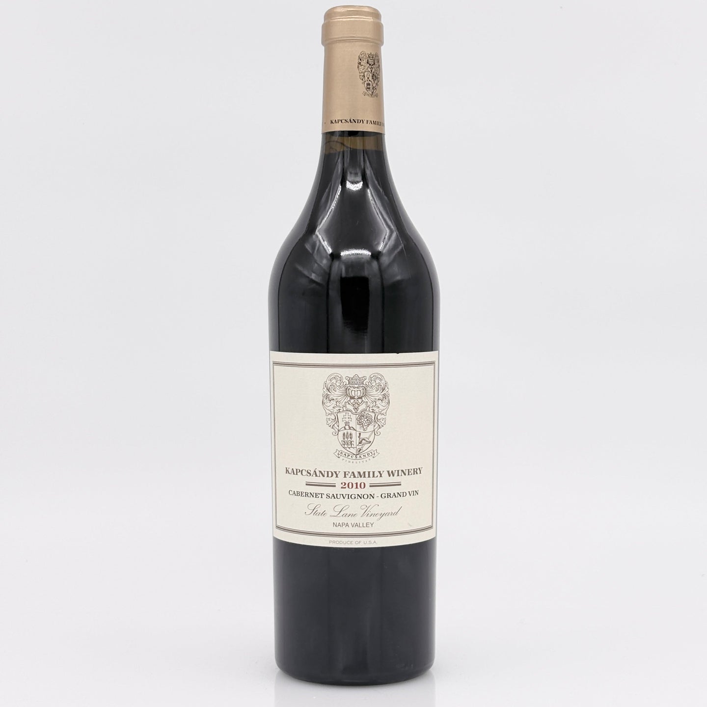 Wine bottle with a label on a light gray background