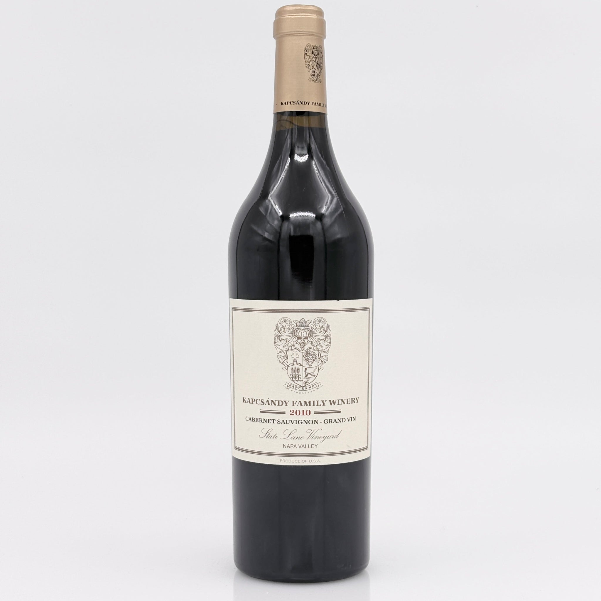 Wine bottle with a label on a light gray background