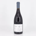 Wine bottle labeled 'Volnay' on a white background