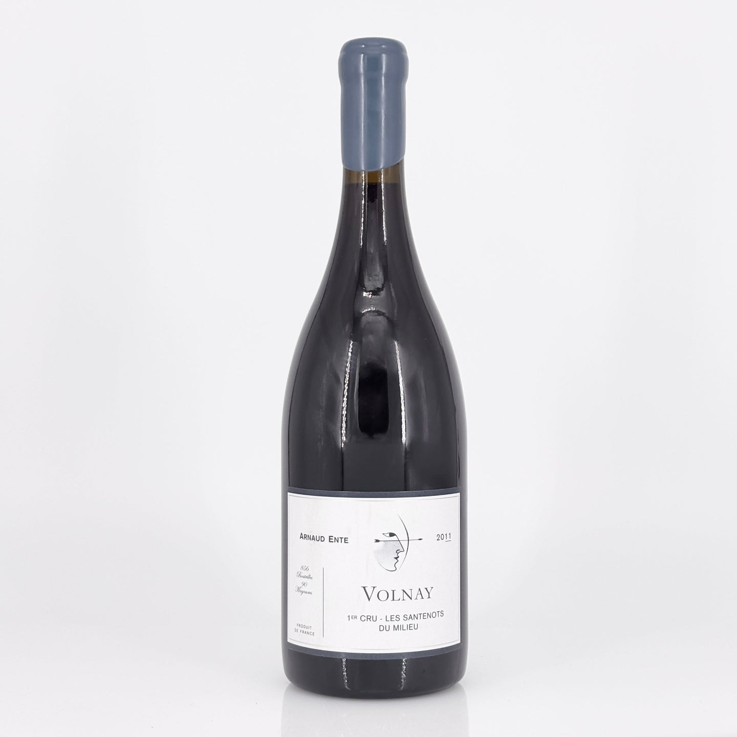 Wine bottle labeled 'Volnay' on a white background