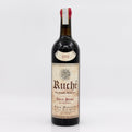 Wine bottle with 'Ruché' label on a white background