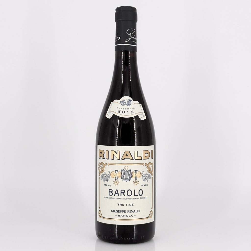 Wine bottle with 'Rinaldi Barolo' label on a white background