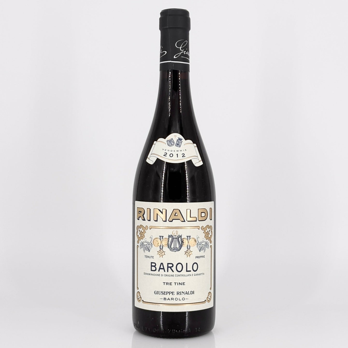 Wine bottle with 'Rinaldi Barolo' label on a white background