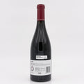 Wine bottle with a label on a white background