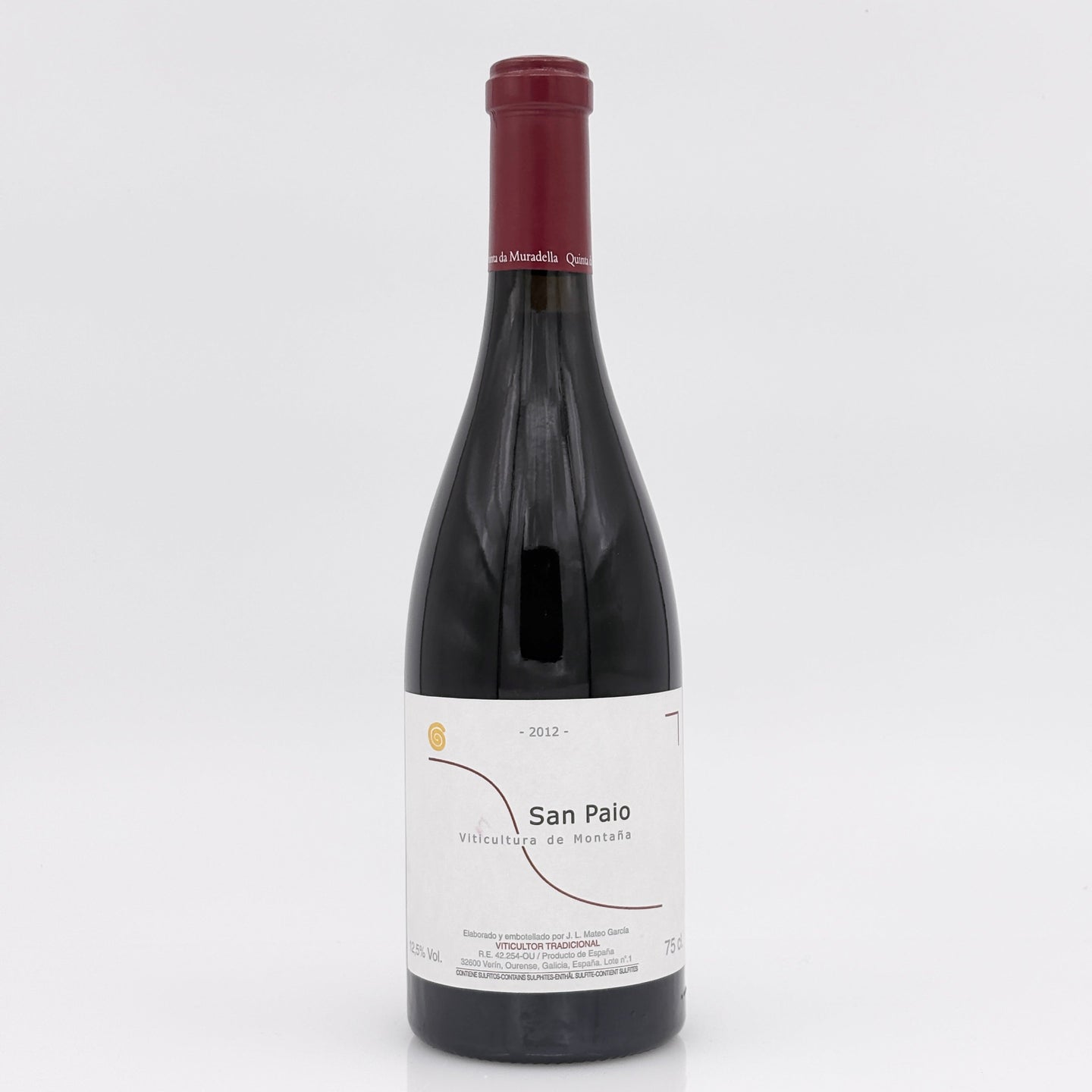 Red wine bottle with a white label on a light gray background