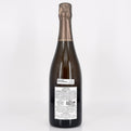Bottle of champagne with a label on a white background