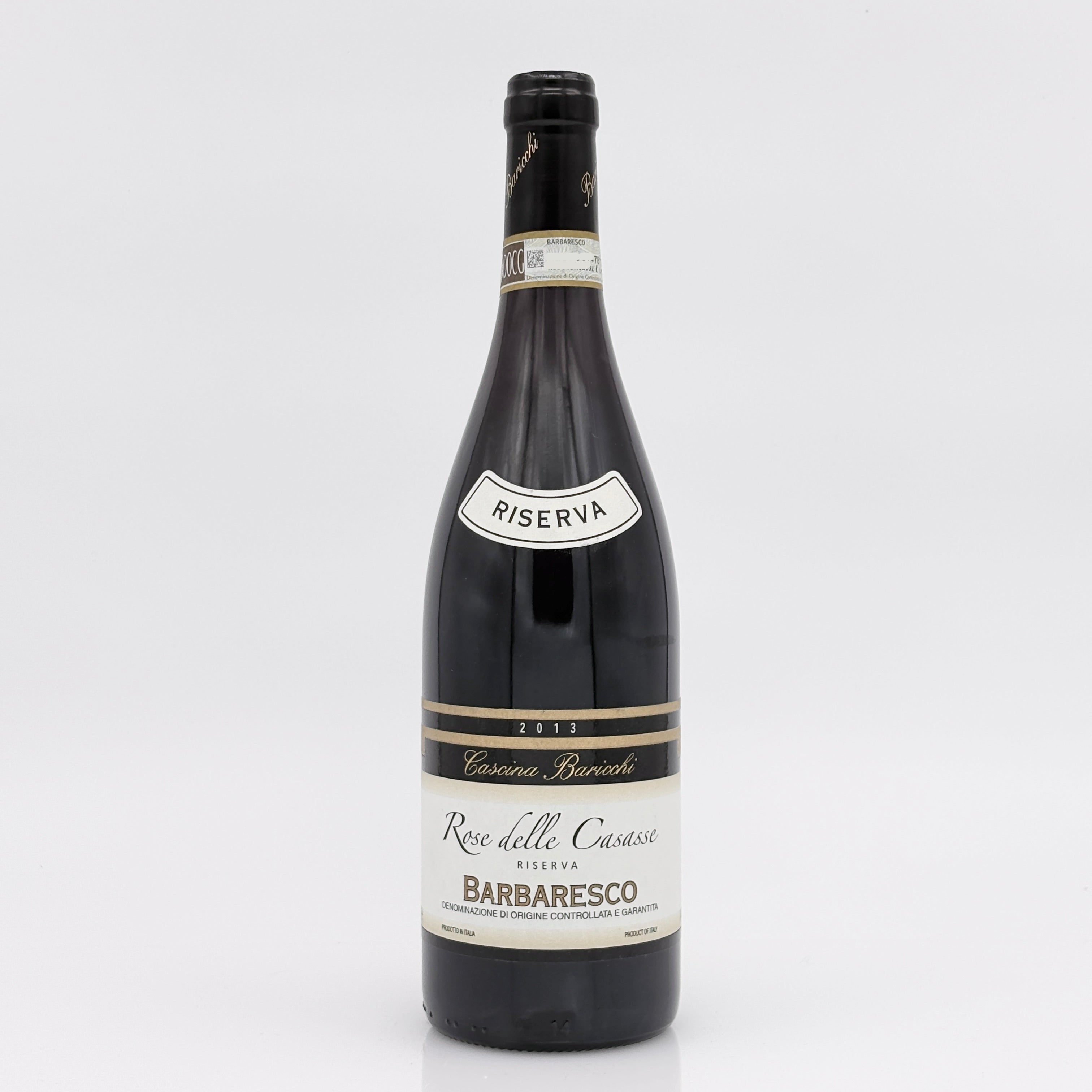 Wine bottle with 'Riserva' label on a white background