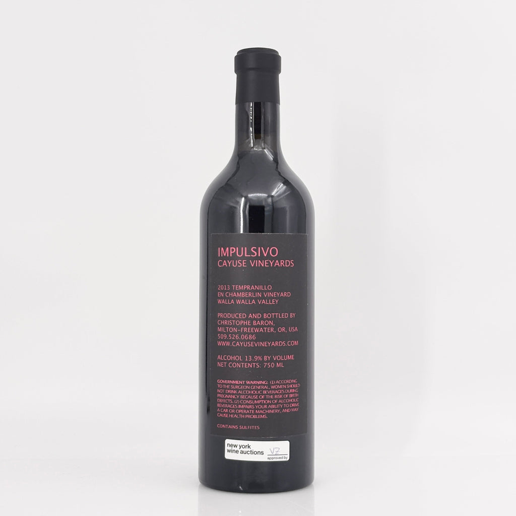 Wine bottle with 'Impulsivo' label on a white background