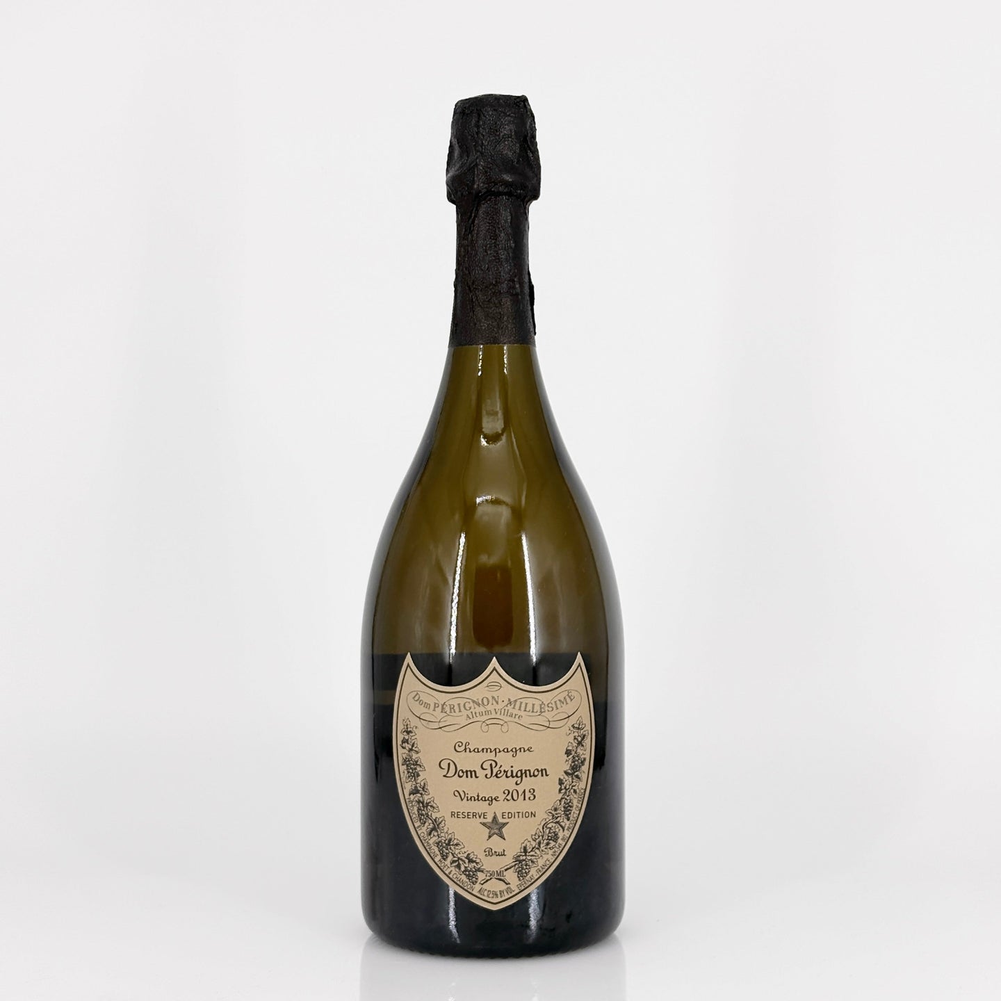 Bottle of Dom Perignon champagne on a white background