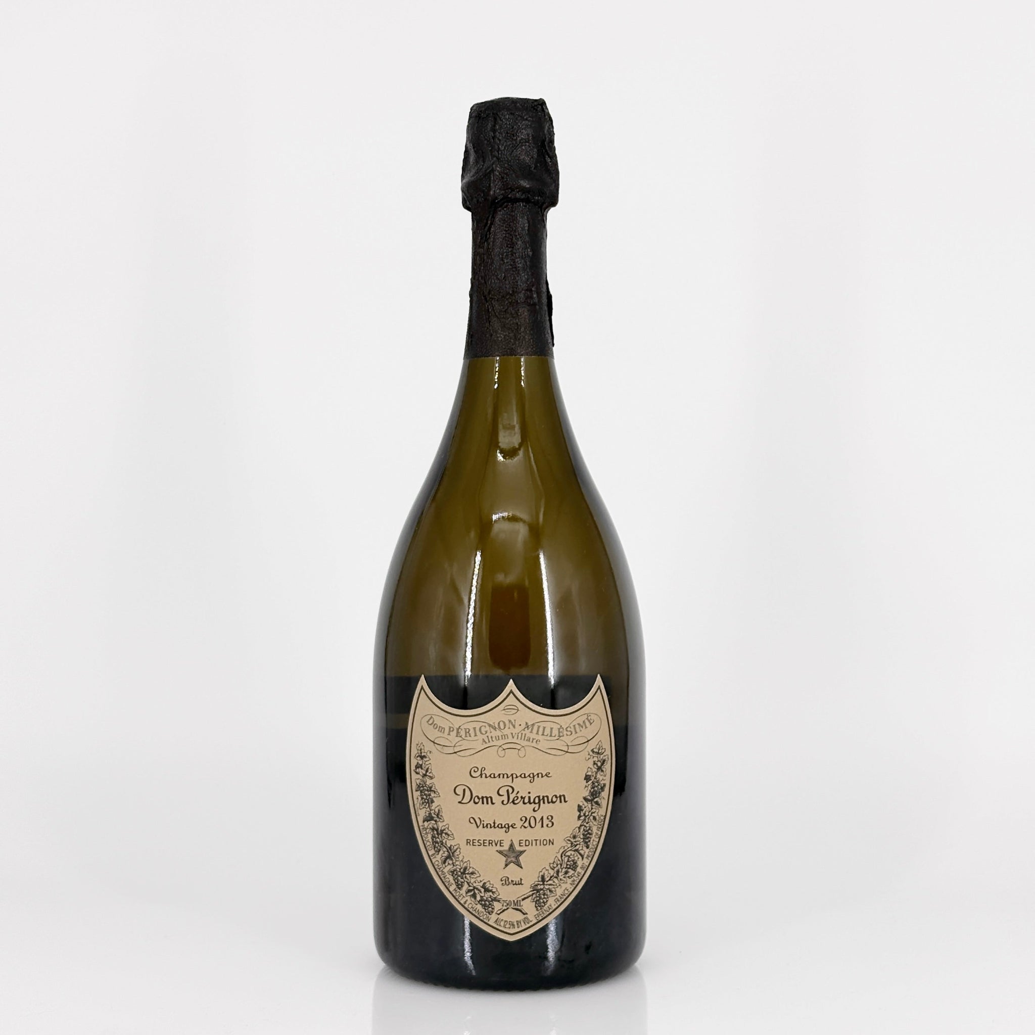 Bottle of Dom Perignon champagne on a white background