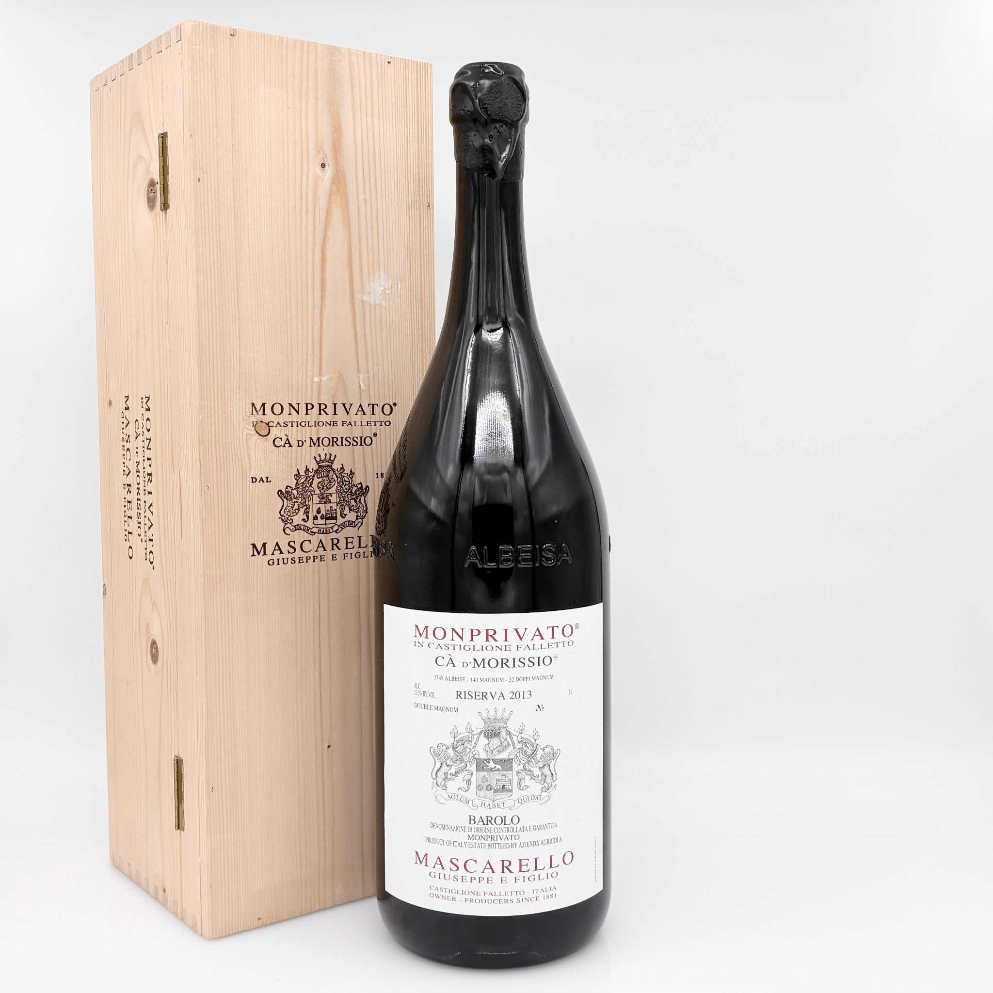 Wine bottle with a wooden box labeled 'Monprivato' on a white background