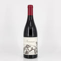 Wine bottle with a decorative label on a white background