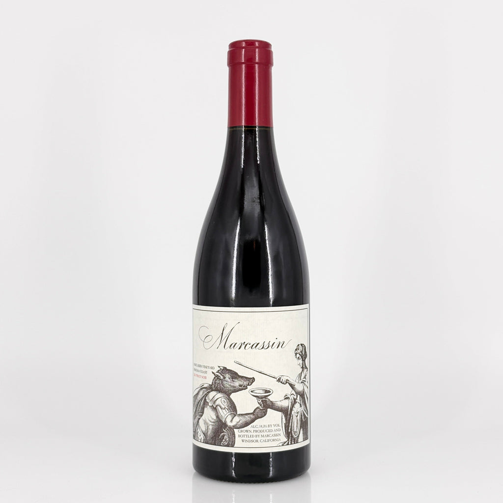 Wine bottle with a decorative label on a white background