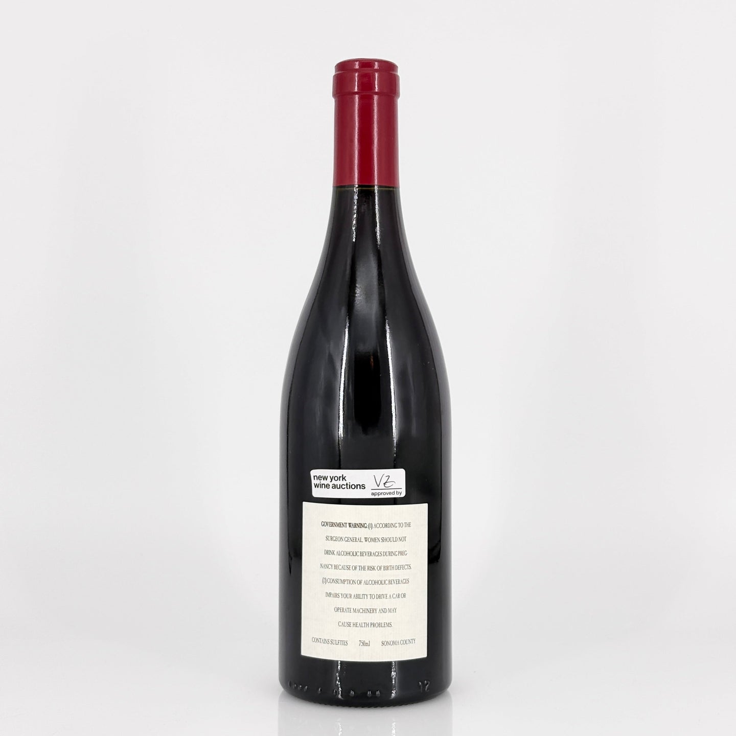 Wine bottle with a label on a white background
