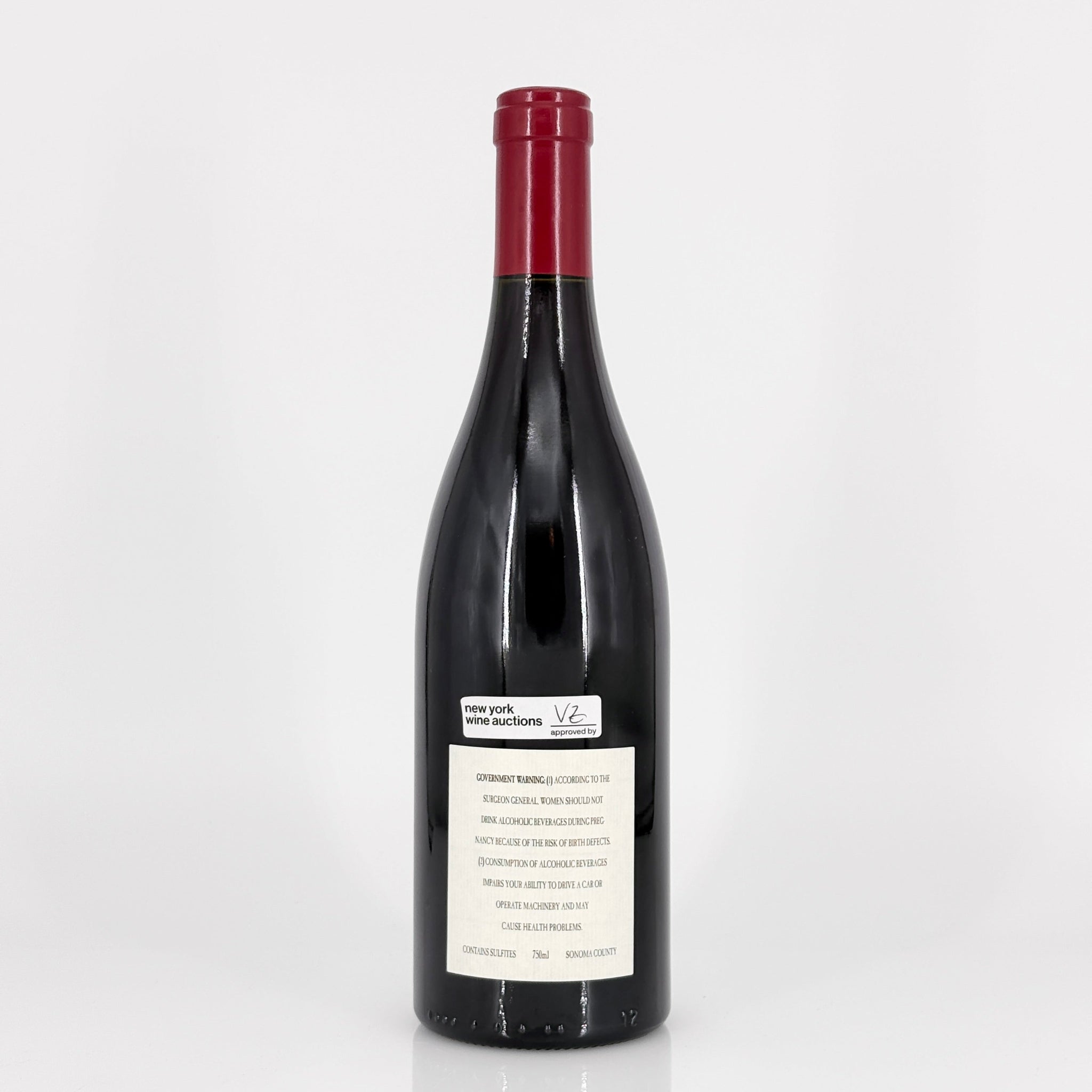 Wine bottle with a label on a white background