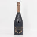 Bottle of champagne with a decorative label on a white background