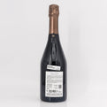 Bottle of champagne with a visible label on a white background