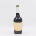 Wine bottle with a beige label on a white background