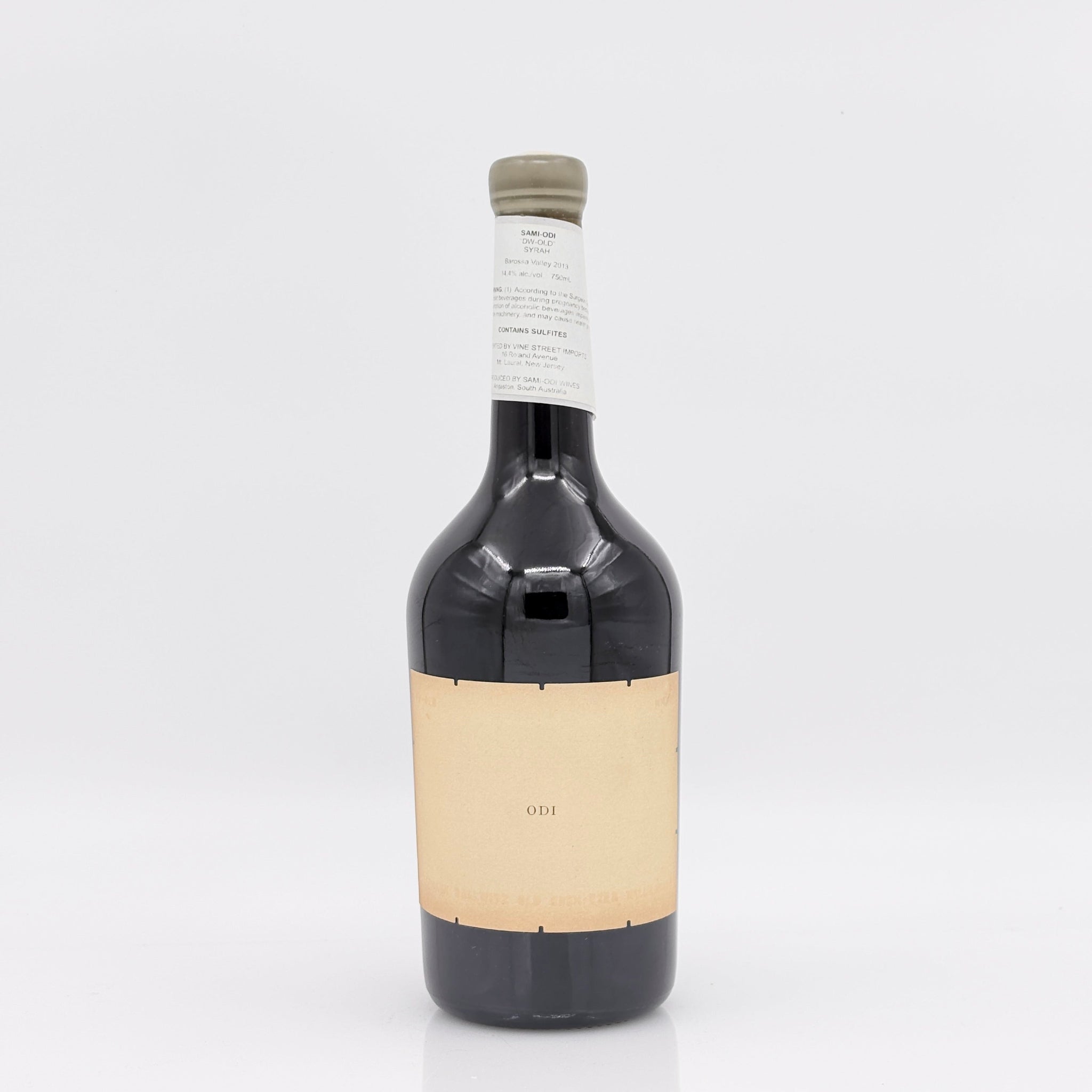 Wine bottle with a beige label on a white background
