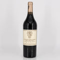 Wine bottle with a visible label on a gray background