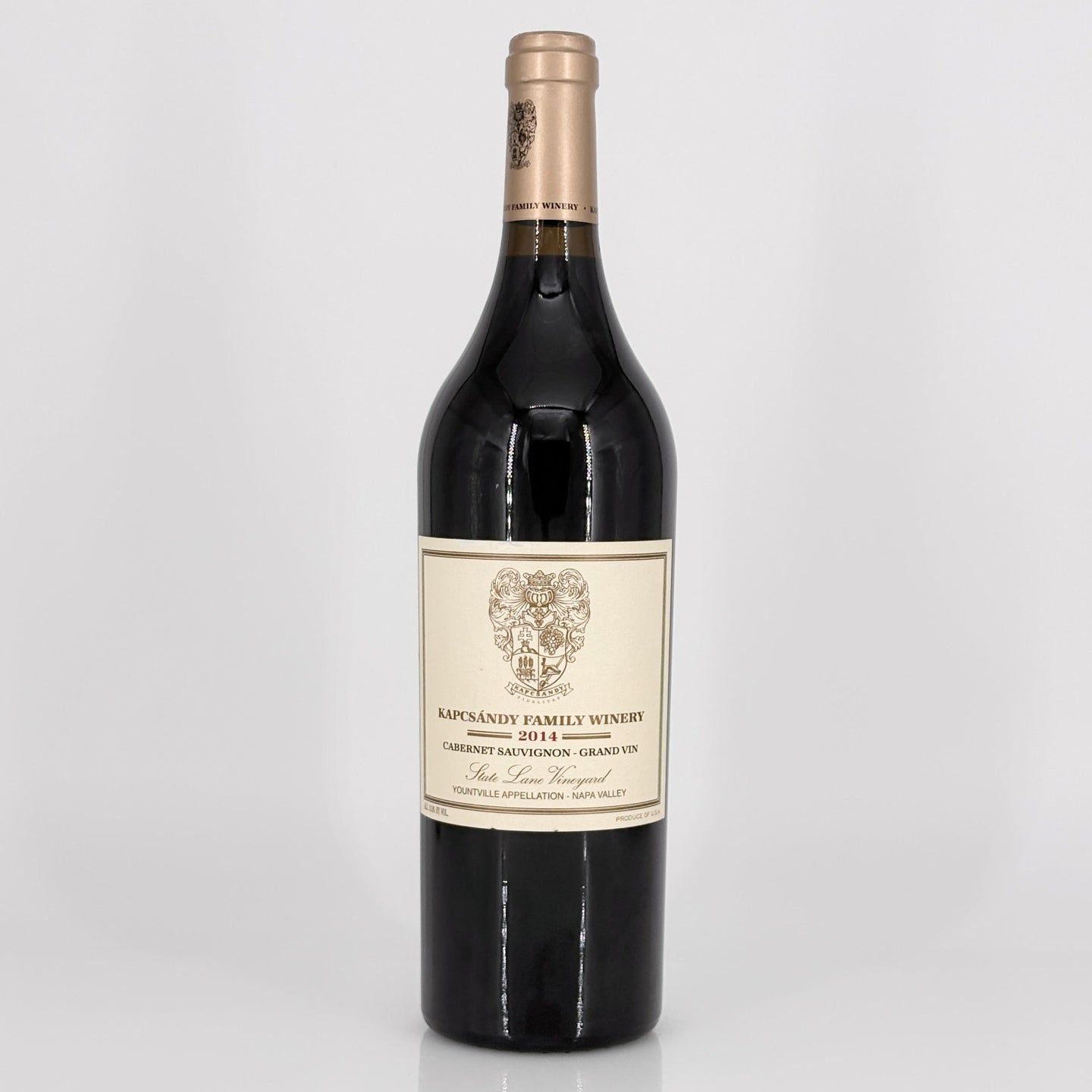 Wine bottle with a visible label on a gray background