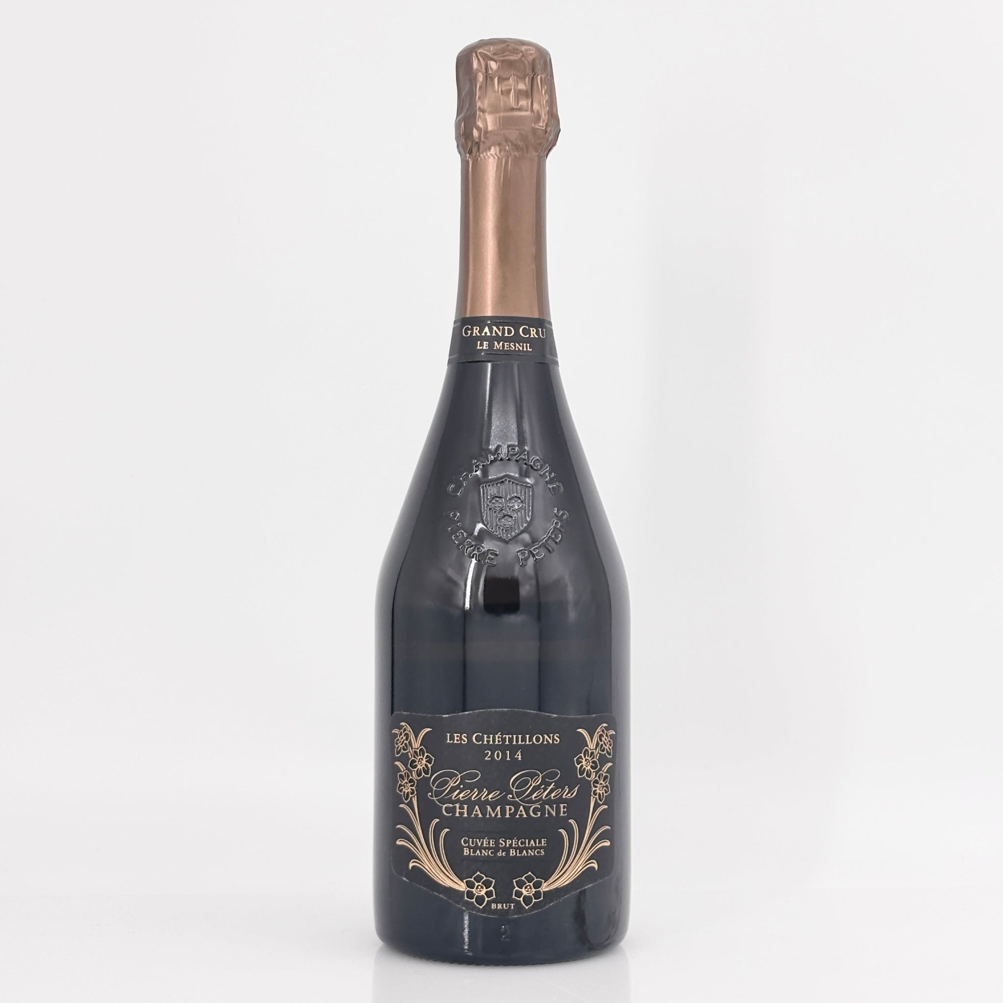 Bottle of champagne with a detailed label on a white background