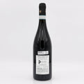 Wine bottle with a label on a white background