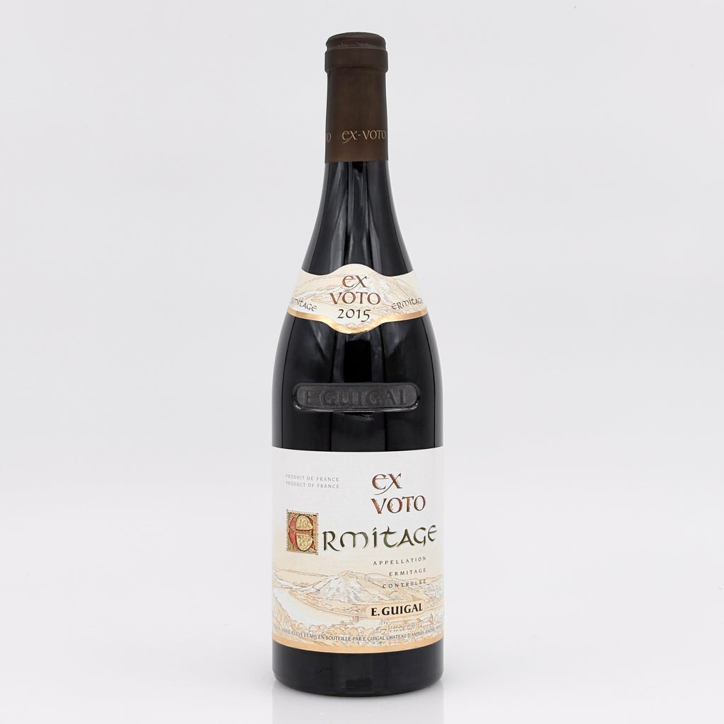 Wine bottle labeled 'Ex Voto' on a white background