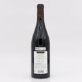 Wine bottle with a label on a white background