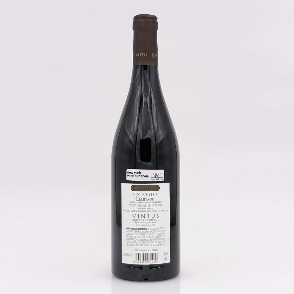 Wine bottle with a label on a white background
