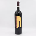 Wine bottle with a gold label on a white background