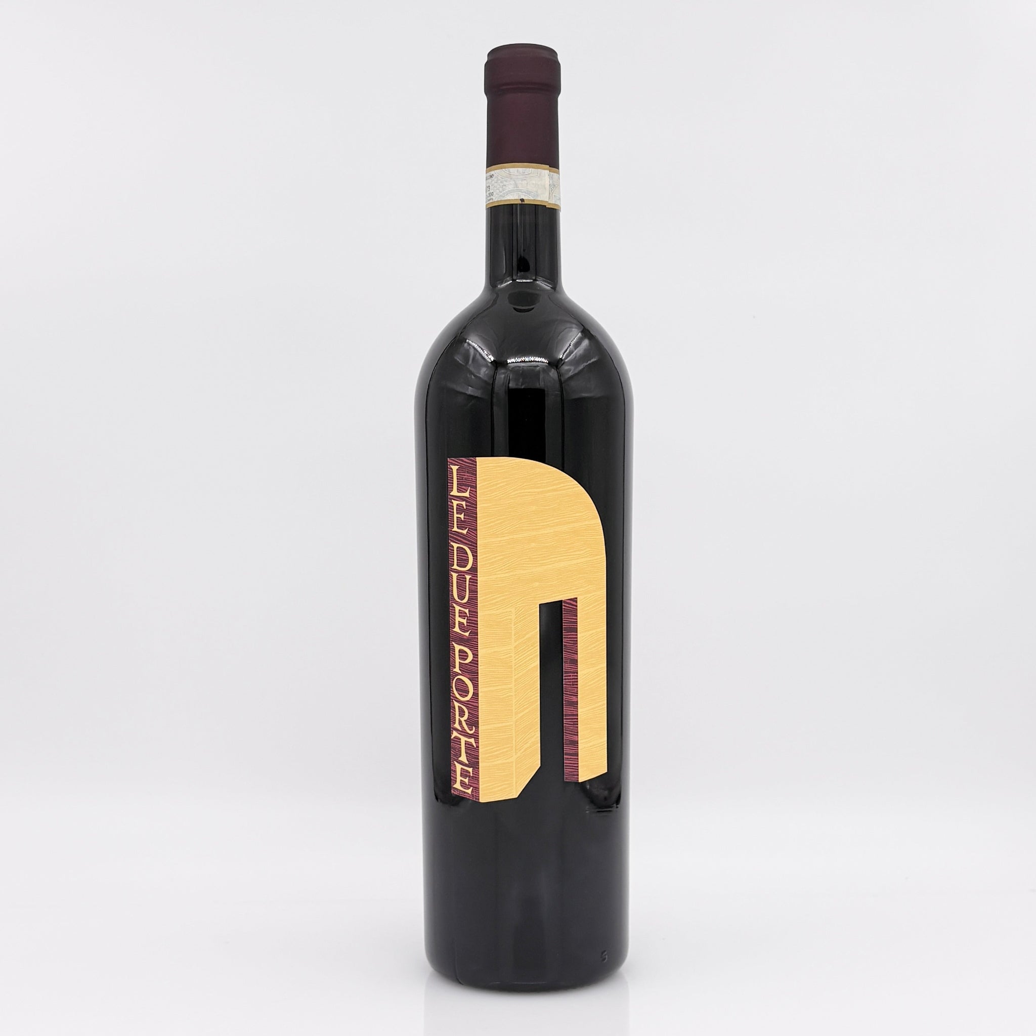 Wine bottle with a gold label on a white background