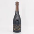 Bottle of champagne with a decorative label on a white background
